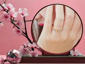 Giá nhẫn kim tiền vàng 18k hiện nay là bao nhiêu?